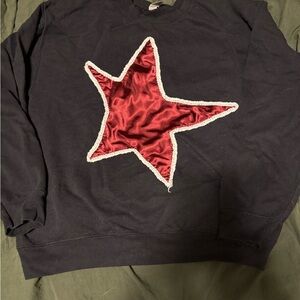 Black Sweatshirt with Red Star Design